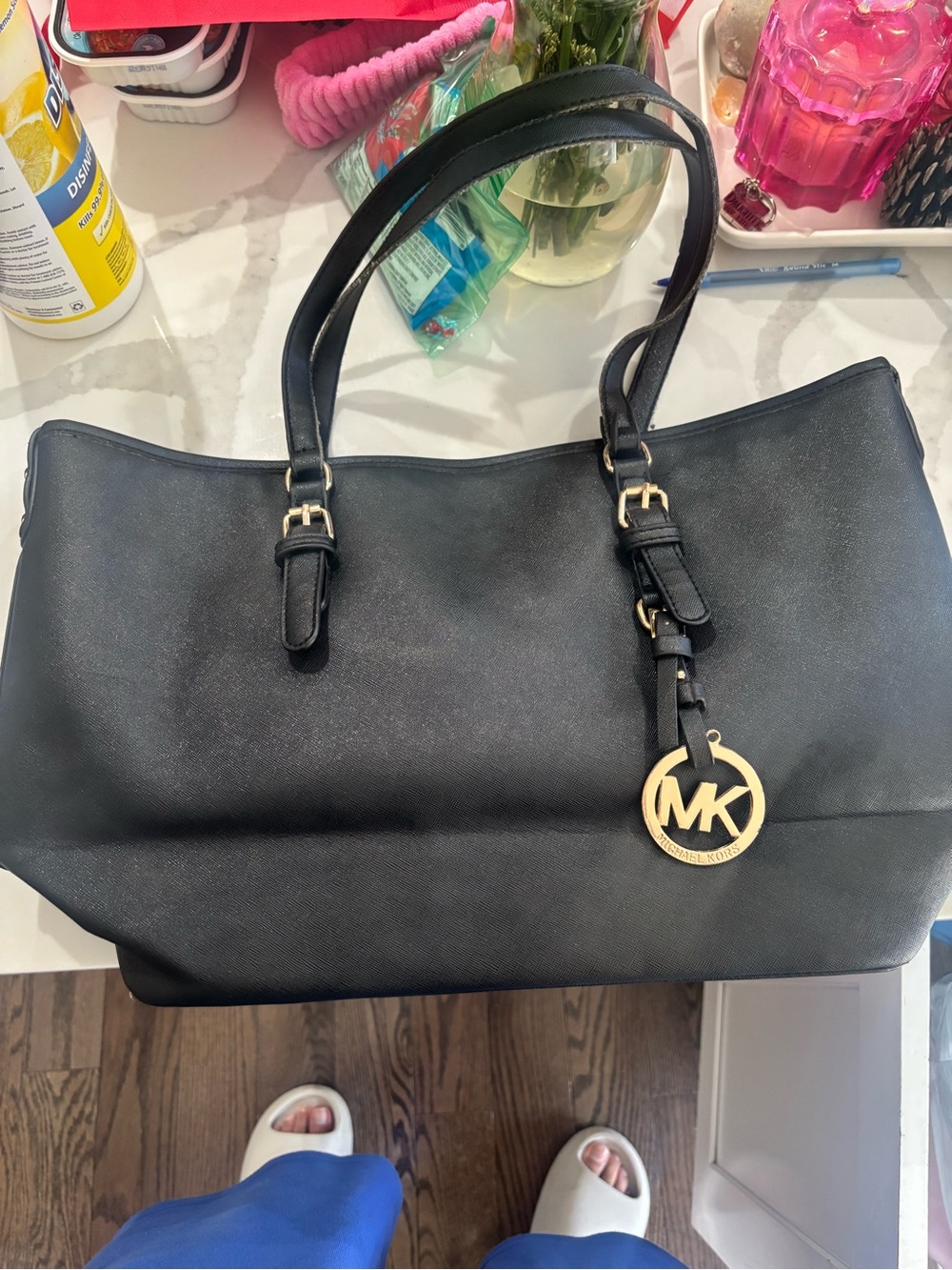 Michael Kors Black Leather Tote with Gold MK Pendant